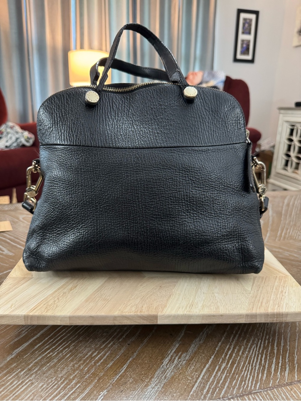 Furla Piper tote bag features gold-tone hardware.